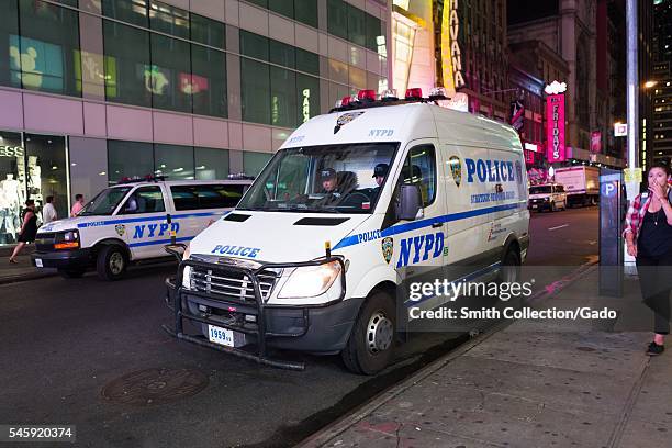 During a Black Lives Matter protest in New York City's Times Square following the shooting deaths of Alton Sterling and Philando Castile, two New...