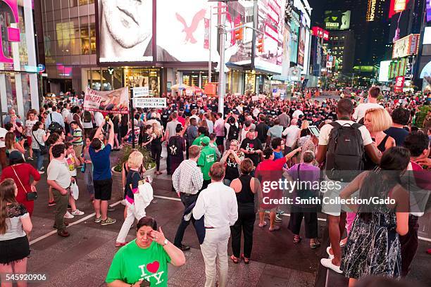 During a Black Lives Matter protest in New York City's Times Square following the shooting deaths of Alton Sterling and Philando Castile, activists...