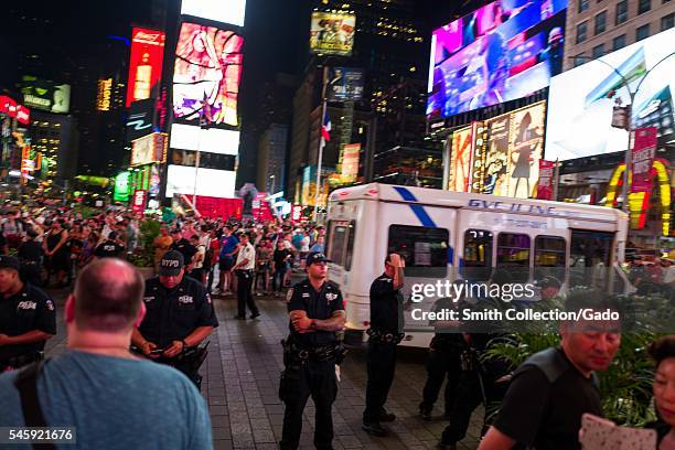 During a Black Lives Matter protest in New York City's Times Square following the shooting deaths of Alton Sterling and Philando Castile, activists...