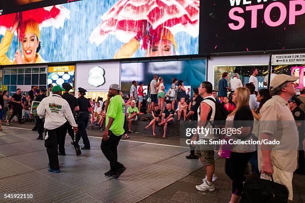 During a Black Lives Matter protest in New York City's Times Square following the shooting deaths of Alton Sterling and Philando Castile, activists...