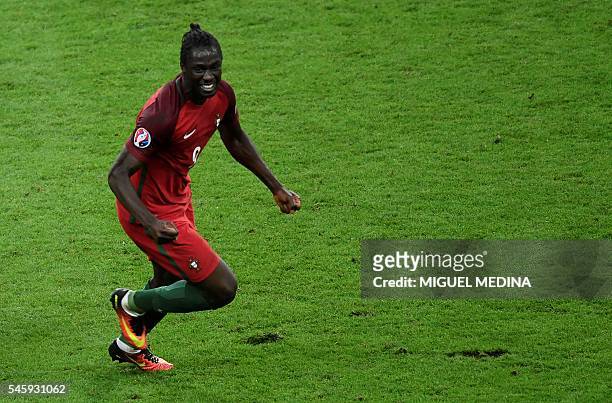 Portugal's forward Eder celebrates after scoring a goal during the Euro 2016 final football match between Portugal and France at the Stade de France...