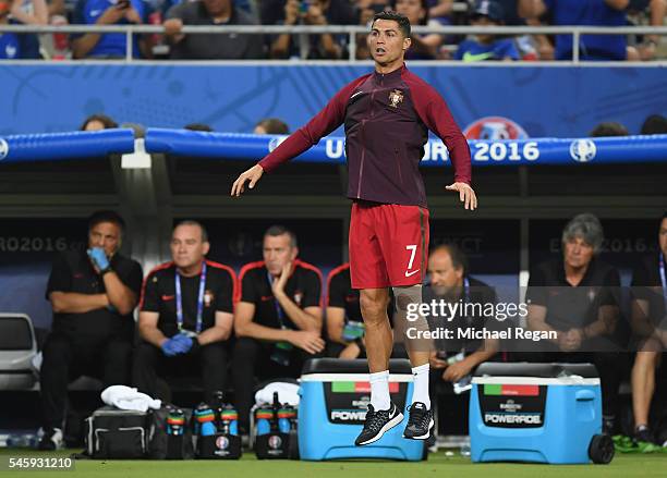 Cristiano Ronaldo of Portugal reacts during the UEFA EURO 2016 Final match between Portugal and France at Stade de France on July 10, 2016 in Paris,...