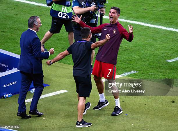 Cristiano Ronaldo of Portugal celebrates with his team staffs after winning the tournament after the UEFA EURO 2016 Final match between Portugal and...