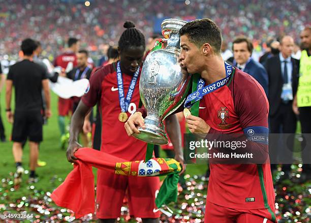 Cristiano Ronaldo of Portugal kisses the Henri Delaunay trophy to celebrate after their 1-0 win against France in the UEFA EURO 2016 Final match...