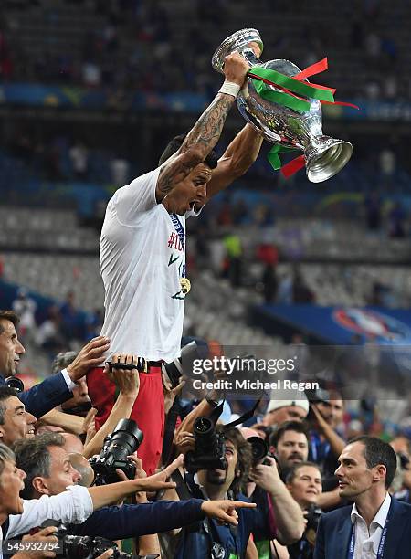 Jose Fonte of Portugal lifts the Henri Delaunay trophy to celebrate after his team's 1-0 win against France in the UEFA EURO 2016 Final match between...