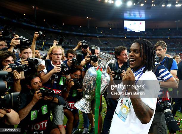 Renato Sanches of Portugal holds the Henri Delaunay trophy to celebrate after his team's 1-0 win against France in the UEFA EURO 2016 Final match...