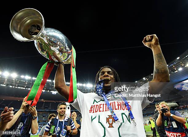 Renato Sanches of Portugal holds the Henri Delaunay trophy to celebrate after his team's 1-0 win against France in the UEFA EURO 2016 Final match...