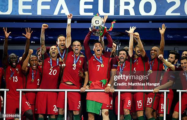 Cristiano Ronaldo of Portugal lifts the Henri Delaunay trophy after his side win 1-0 against France during the UEFA EURO 2016 Final match between...