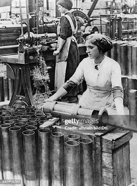 Young women working on cartridges in a munitions factory- around 1916
