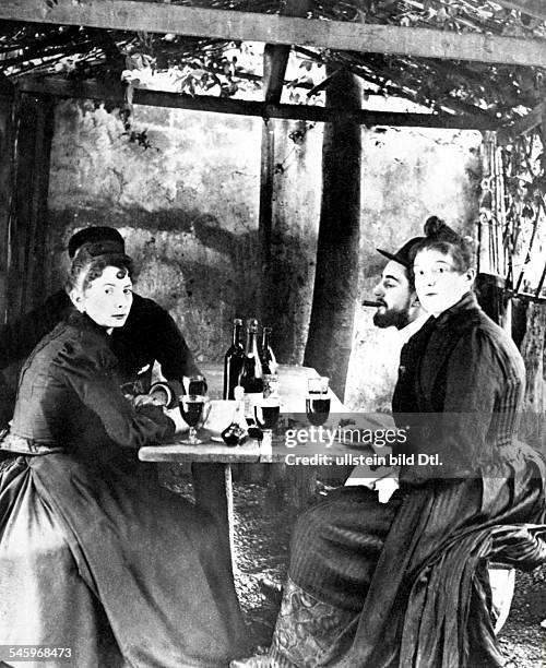 Bildender Künstler, Maler; Frankreich Lautrec trinkt im Garten des "Moulin de la Galette" in Paris mit Freunden Wein- ohne Jahr