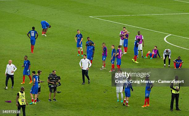 France players look dejected at full time during the UEFA Euro 2016 Final match between Portugal and France at Stade de Lyon on July 10 in Paris,...