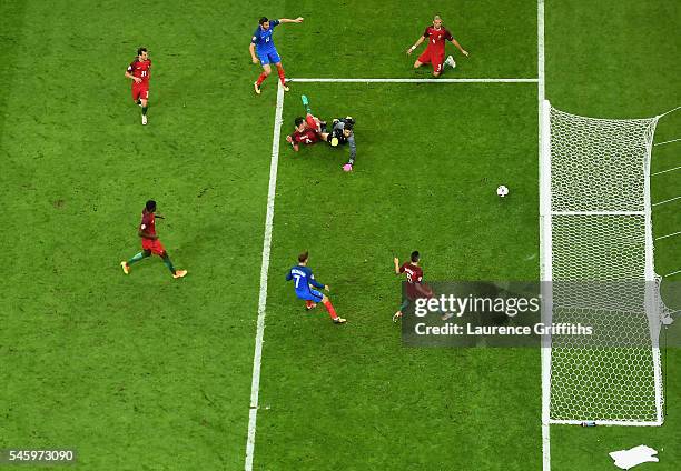 Andre-Pierre Gignac of France has a shot on goal which hits the post during the UEFA EURO 2016 Final match between Portugal and France at Stade de...