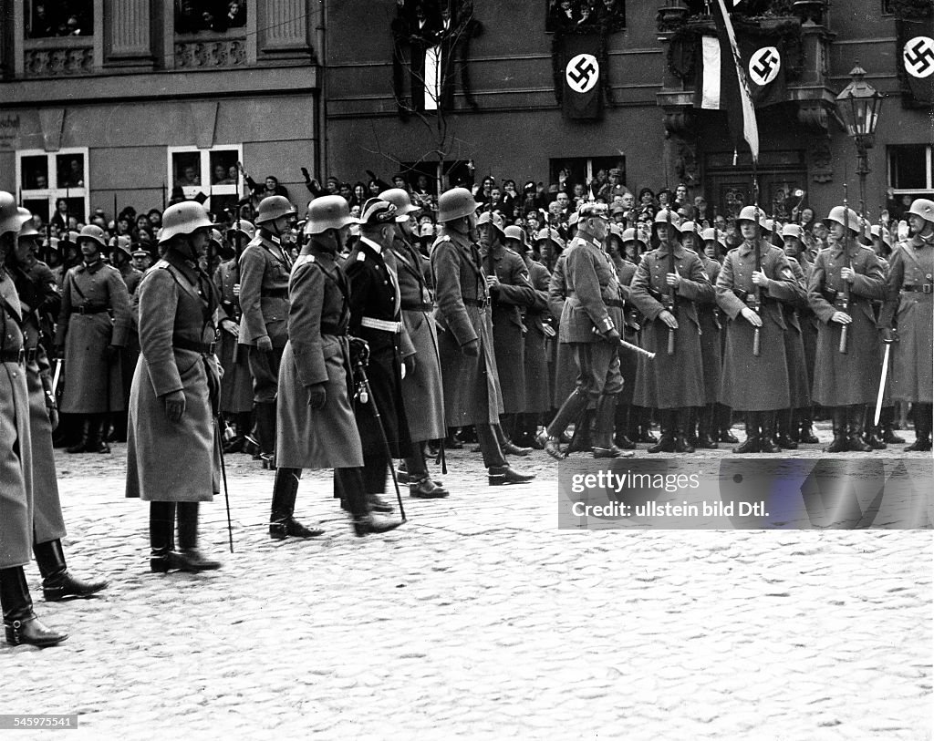 Third Reich , opening of the Reichstag, 'Day of Potsdam' 21.03.1933: President of the Reich Paul von Hindenburg together with chief commanders of the Reichswehr taking the salute of the honour guard lining the street in front of the Garnison-church. 