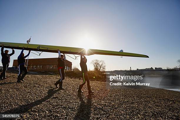 flat age rowing - leading people across a bridge stock pictures, royalty-free photos & images