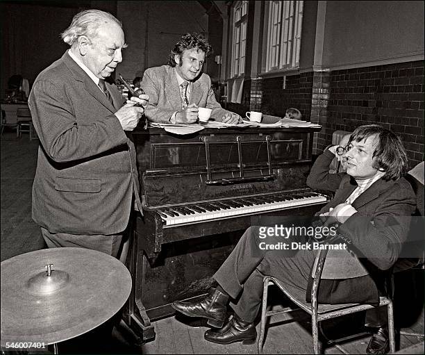 Author JB Priestley with musician, composer and conductor Andre Previn and lyricist Johnny Mercer behind him during rehearsals for a musical version...