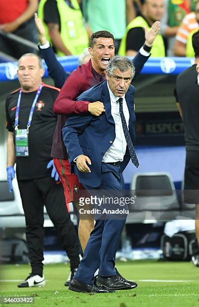 Portugal's Cristiano Ronaldo and head coach of Portugal Fernando Santos are seen during the Euro 2016 final football match between Portugal and...