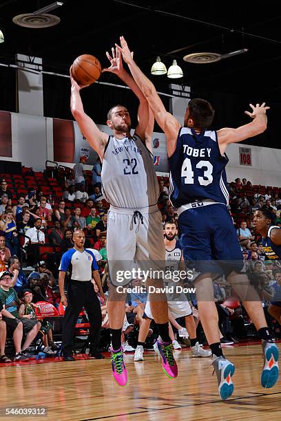 Alex Olah of the New Orleans Pelicans shoots against Mike Tobey of Utah Jazz during the 2016 Las Vegas Summer League on July 10, 2016 at Cox Pavillon...