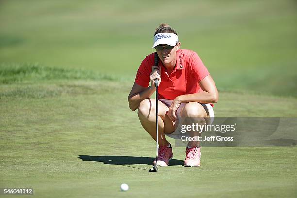 Brittany Lang lines up a putt on the 17th hole during a playoff against Anna Nordqvist of Sweden during the final round of the U.S. Women's Open at...