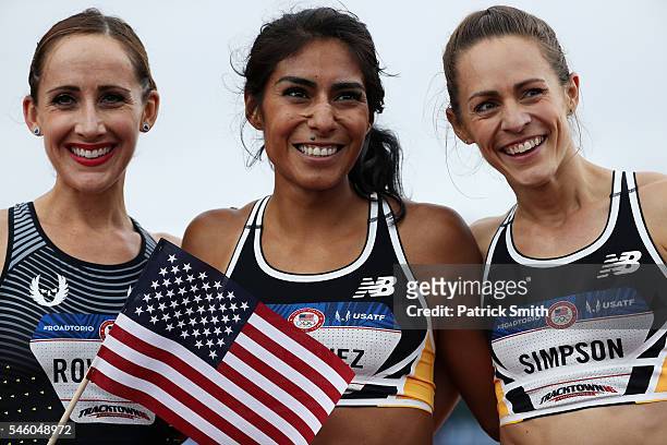 Jenny Simpson, first place, Shannon Rowbury, second place, and Brenda Martinez, third place, celebrate after the Women's 1500 Meter Final during the...