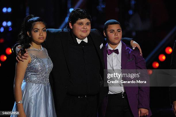 Finalists Alejandra Gallardo, Christopher Rivera and Axel Cabrera stand together during Telemundo "La Voz Kids" Finale at Universal Orlando on July...
