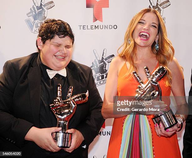 La Voz Kids" winners Christopher Rivera and singer Natalia Jimenez smile after Telemundo "La Voz Kids" Finale at Universal Orlando on July 9, 2016 in...