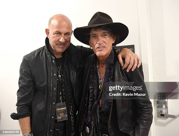 John Varvatos and Joe Perry backstage before Hollywood Vampires perform at Ford Ampitheater at Coney Island Boardwalk on July 10, 2016 in Brooklyn,...