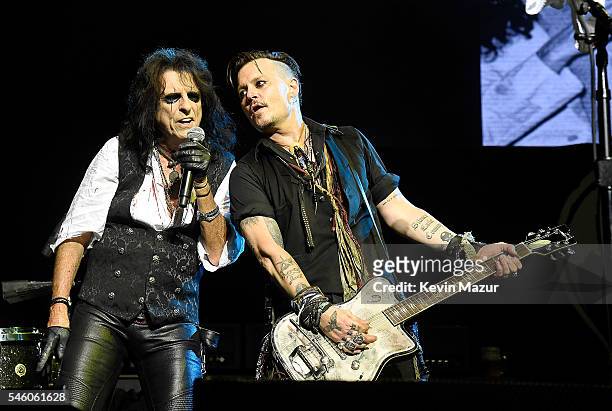 Alice Cooper and Johnny Depp of Hollywood Vampires perform at Ford Ampitheater at Coney Island Boardwalk on July 10, 2016 in Brooklyn, New York.