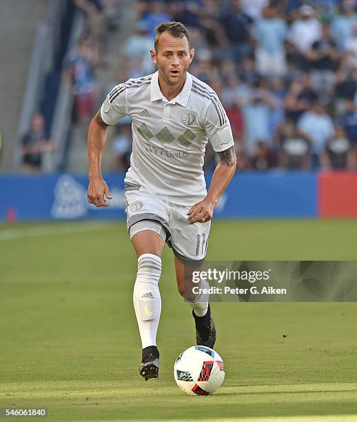 Forward Brad Davis of Sporting Kansas City carries the ball up field against New York City FC during the first half on July 10, 2016 at Children's...