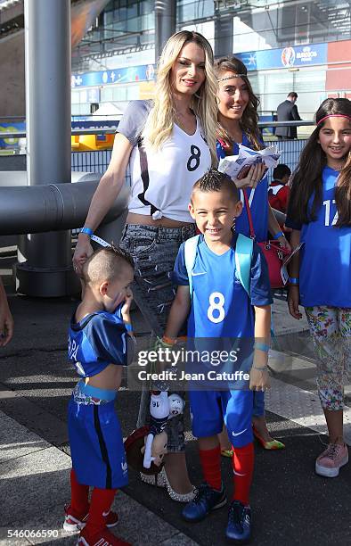 Ludivine Payet and her kids Noa Payet and Milan Payet attend the UEFA Euro 2016 final match between Portugal and France at Stade de France on July...