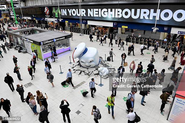 Stay Puft Marshmallow Man is seen on the concourse at Waterloo Station on July 11, 2016 in London, England. Ghostbusters take over Waterloo Station...