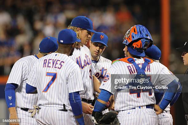 July 08: Pitcher Noah Syndergaard of the New York Mets talking with Manager Terry Collins before coming out of the game in the fifth inning during...