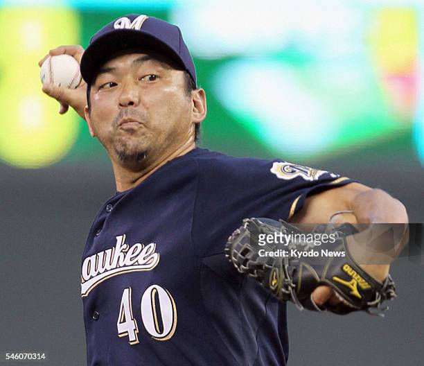 United States - Milwaukee Brewers right-hander Takashi Saito pitches against the Minnesota Twins at Target Field in Minneapolis on July 2, 2011....