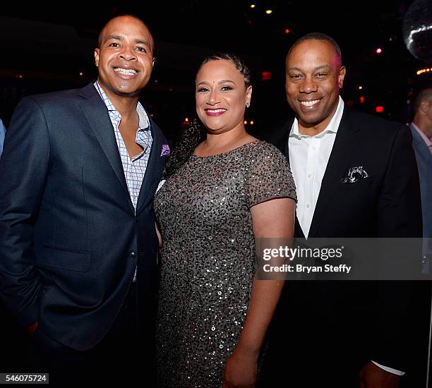 Sportscaster Mike Hill, Stephanie Harris and ESPN analyst Jay Harris attend the Coach Woodson Las Vegas Invitational red carpet and pairings party at...