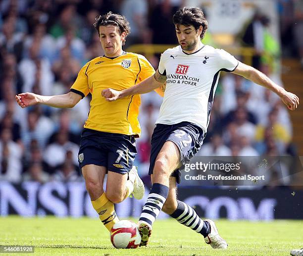 Robert Koren of West Bromwich Albion challenges Vedran Corluka of Tottenham Hotspur during the Barclays Premier League match between Tottenham...
