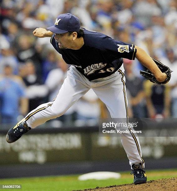 United States - Milwaukee Brewers pitcher Takashi Saito strikes out Arizona Diamondbacks outfielder Gerardo Parra in the sixth inning of an MLB...
