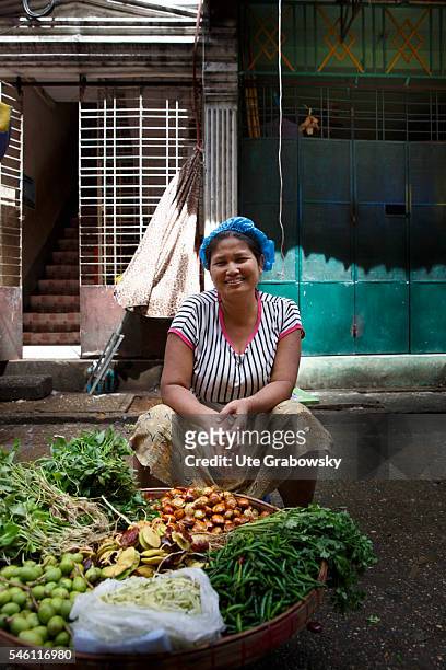 Yangon, Myanmar Dealer at her stall at a market in Yangon on June 16, 2016 in Yangon, Myanmar.