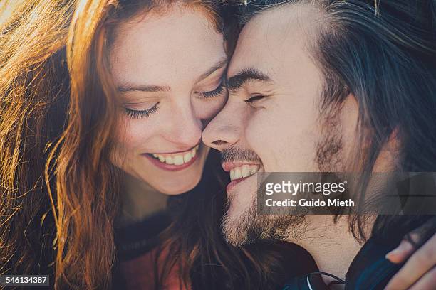 young couple in love. - liebe stock-fotos und bilder