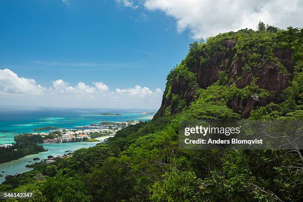 tropical cliffs and the coastline with development - victoria seychelles fotografías e imágenes de stock