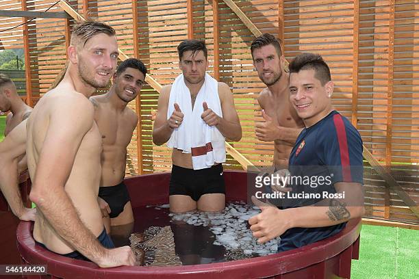 Norbert Gyomber , Emerson Palmieri, Ervin Zukanovic, Kevin Strootman and Juan Manuel Iturbe after an AS Roma training session on July 11, 2016 in...