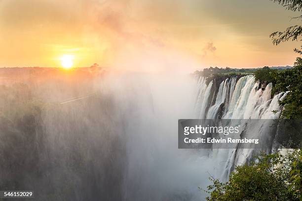 dusk at victoria falls - victoria falls sunset stock pictures, royalty-free photos & images