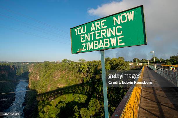 entering zimbabwe sign - zimbabwe stock pictures, royalty-free photos & images