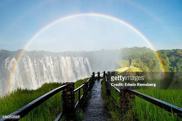 rainbow ver victoria falls walkway - zambezi river stock pictures, royalty-free photos & images
