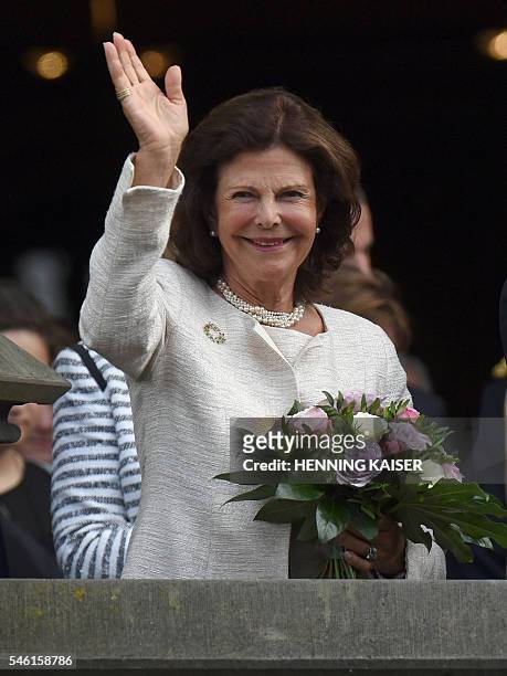 Queen Silvia of Sweden is pictured during a welcoming ceremony on July 11, 2016 at the townhall in Aachen. / AFP / dpa / Henning Kaiser / Germany OUT