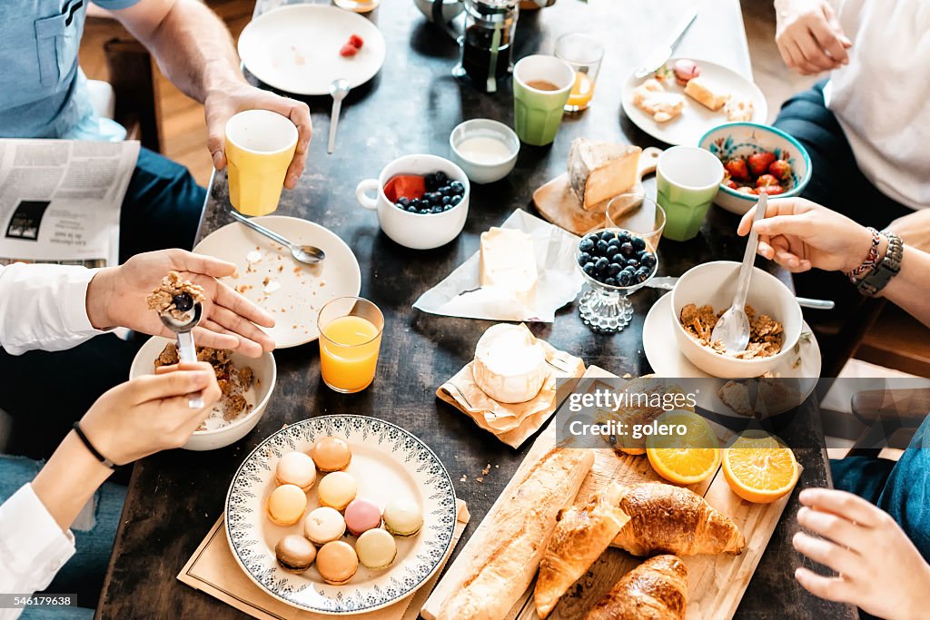 Family having breakfast together at weekend
