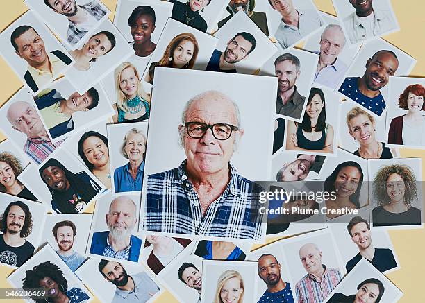 standing out from the crowd - surrounding stock pictures, royalty-free photos & images