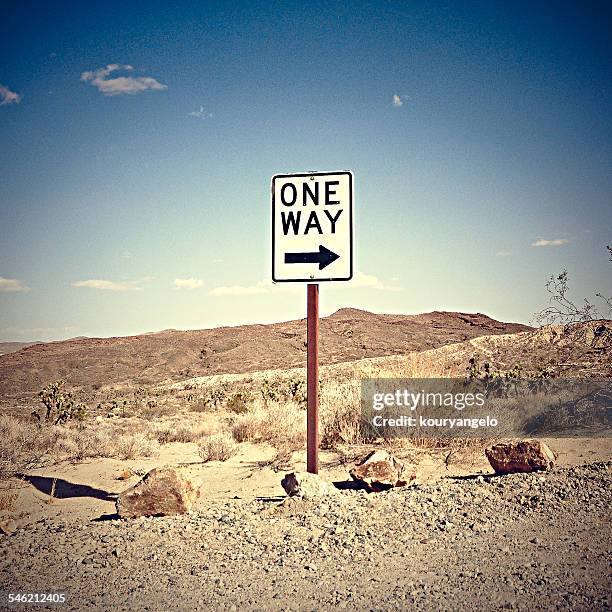 one way sign in desert, california, america, usa - one way communication stock pictures, royalty-free photos & images
