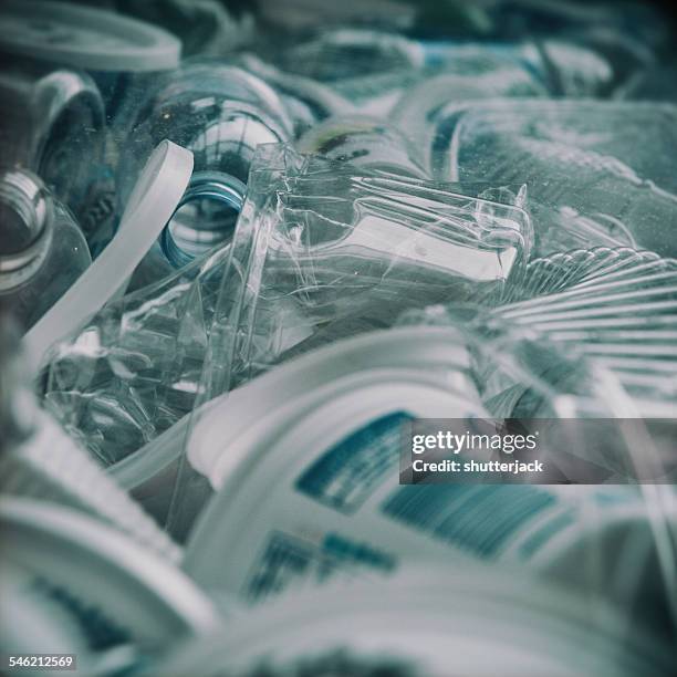 plastic bottles at recycling center - centro di riciclaggio foto e immagini stock