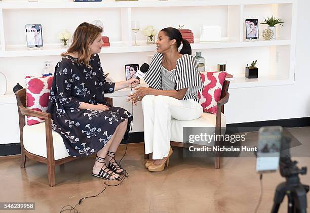 Actress Renee Elise Goldsberry speaks to Facebook Live during a luncheon hosted by Glamour and Facebook to discuss the 2016 election at Samsung 837...