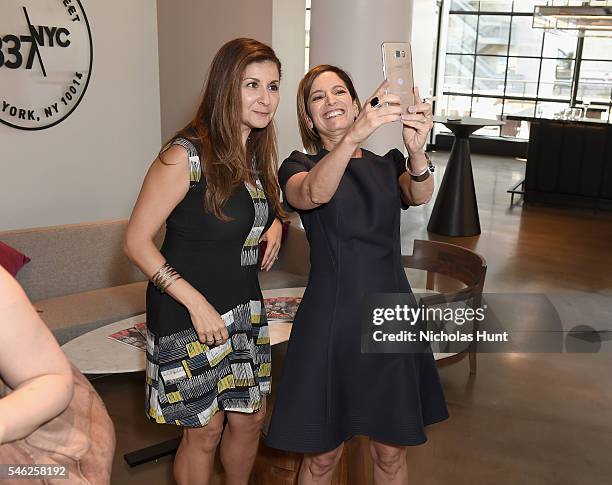 Of Marketing Excellence for Samsung Electronics America, Michelle Froah and Glamour editor in chief Cindi Leive attend a luncheon hosted by Glamour...
