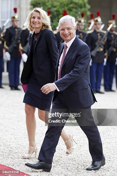 President of the French National Assembly Claude Bartolone and his wife Veronique Bartolone arrive at the Elysee Presidential Palace for a state...